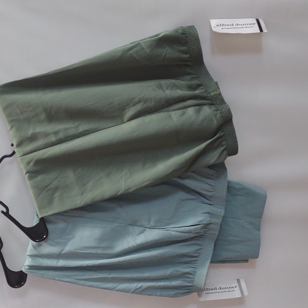 Two pairs of Alfred dunner proportioned short elastic waist pants.